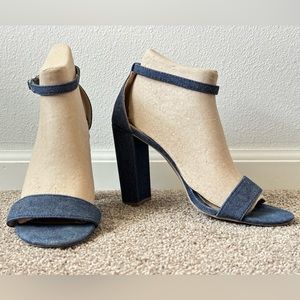 Brash open toe high heels. Blue Demi material.